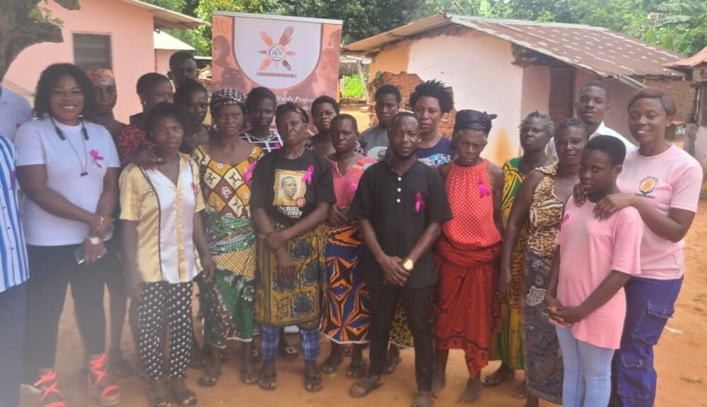 • Hon. Esther Asamah Donkor and Hon Emmanuel Nortei Senior, in a group photography with AIHTNP team and some attendees
