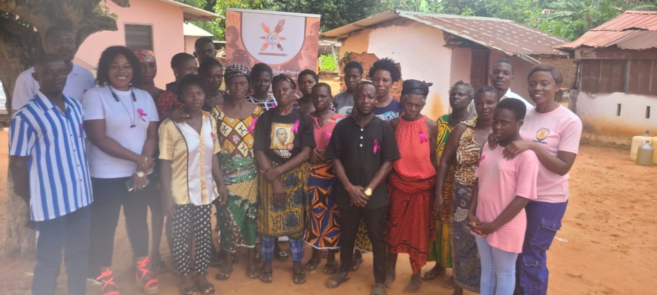 • Hon. Esther Asamah Donkor and Hon Emmanuel Nortei Senior, in a group photography with AIHTNP team and some attendees