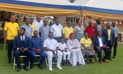Pastor Sarpong (Second from right, standing) and Pastor Okyere Baffour (first from right, seated) with leaders of the church