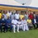 Pastor Sarpong (Second from right, standing) and Pastor Okyere Baffour (first from right, seated) with leaders of the church