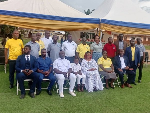 Pastor Sarpong (Second from right, standing) and Pastor Okyere Baffour (first from right, seated) with leaders of the church