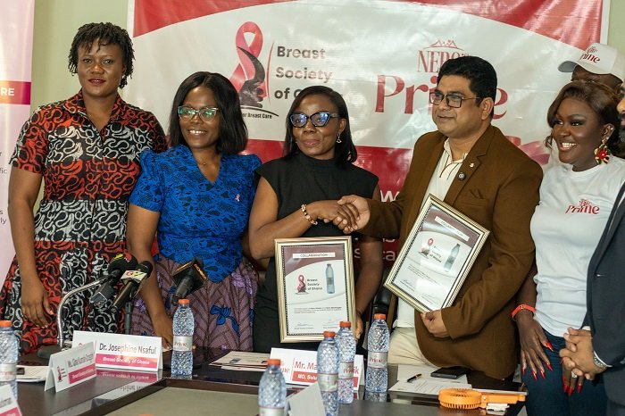 Mr Pattnaik (Right) andDr Nsaful (left) in a handshake