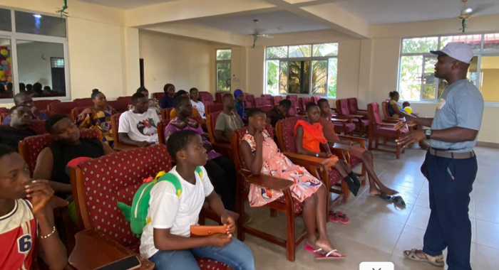 A facilitator addressing the participants