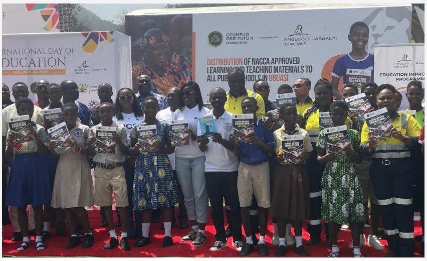 Students in a group photograph with organisers