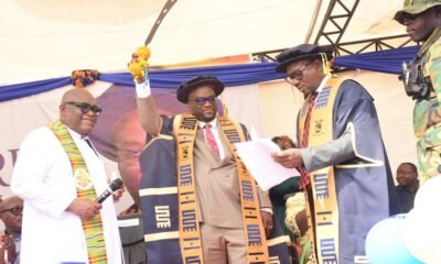 The sword of leadership beign handed over the newly inducted Vice Chancelor