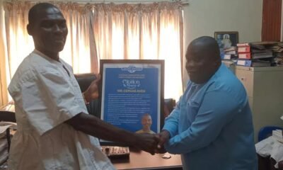 Mr Cephas Aveh (left) receiving a citation from Mr Koomson