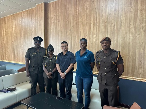 DDP Yayra Ashong Mettle, OIC of SCC( 2nd from and left) Mr Leon, Branch Manager of Zonda Tech Dzorwulu in a group photo, flanked by other officers and staff members of Zonda