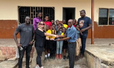 The founder of Street Academy recieving the items