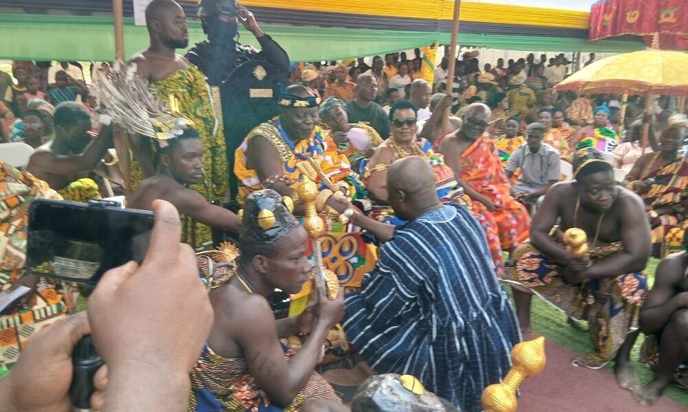 Ahmed Ibrahim exchanging pleasantaries with the chief