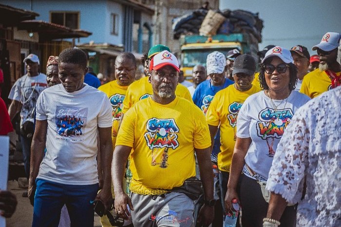 Dr Albert Tetteh Botchway (middle) walking with other participants