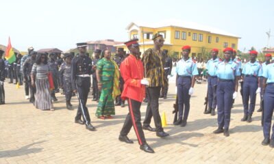 Mr Anyetei (right) being assisted by Ms Sowah (second row, second from left) and Ms Kotomah (third row, left) to inspect the parade Photo Victor A. Buxton