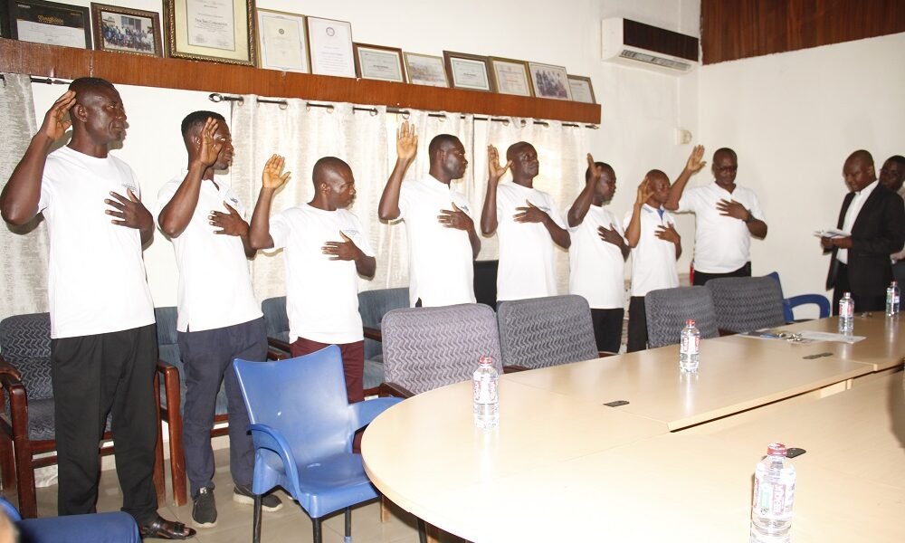 Mr. Atakey [right] inaugurating thr members of the Union. Photos Okai Elizabeth.