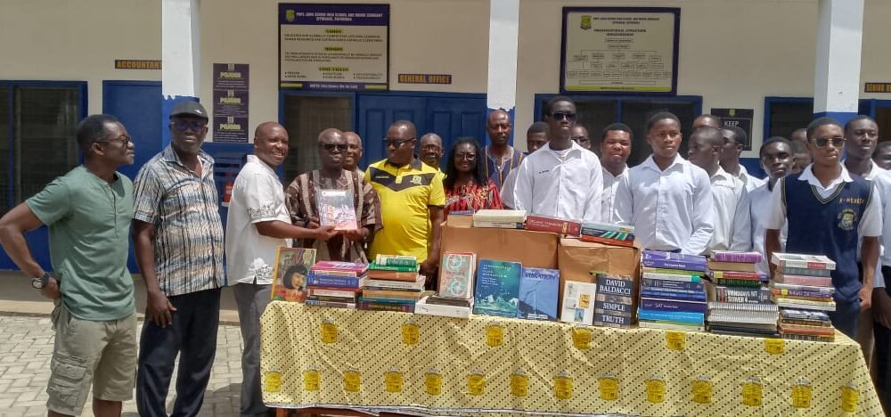 Rev Fr. Ben Ohene Opoku (third left) receiving the items on behalf of the students from Mr Duodu Adjei.