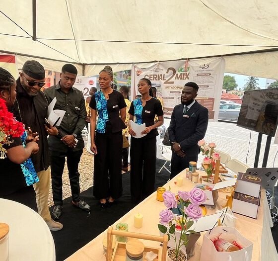 Director-General of the National Sports Authority (NSA), Yaw Ampofo Ankrah assessing the work of some students