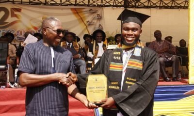 Dr. Clement Abas Apaak [left] presenting the Overall best student award to master Dzade Kingsley.Photo Okai Elizabeth.