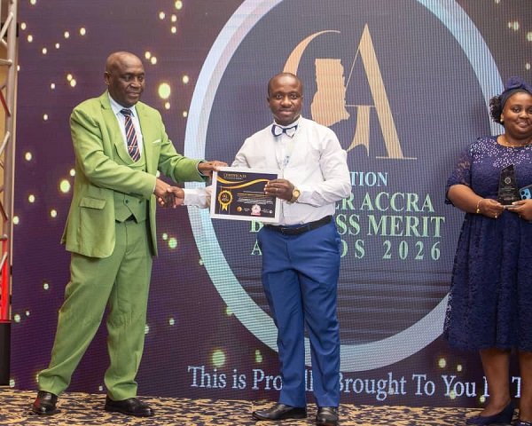 Rev Offei receiving his award