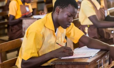 A pupil of government school wirting exams