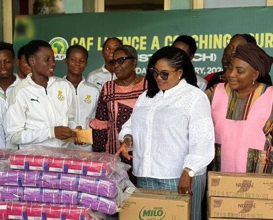 Dr Lartey presenting items to players