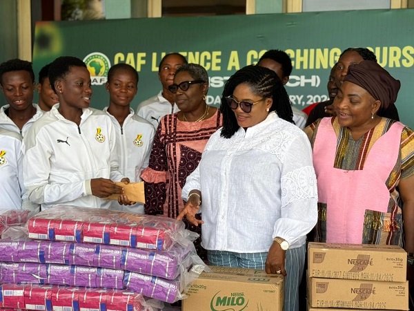 Dr Lartey presenting items to players
