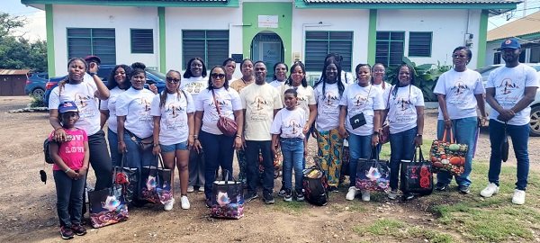 Mrs Ayivor (Middle) in a group picture with her team members