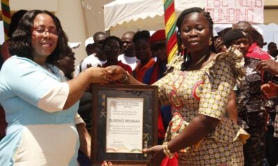 Ms Linda Ocloo presenting an award to award winner.