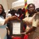 Ms Linda Ocloo presenting an award to award winner.