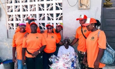 The team during a visit to a beneficiary