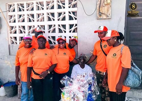 The team during a visit to a beneficiary
