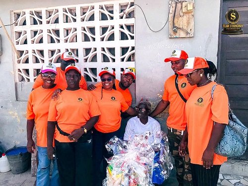 The team during a visit to a beneficiary
