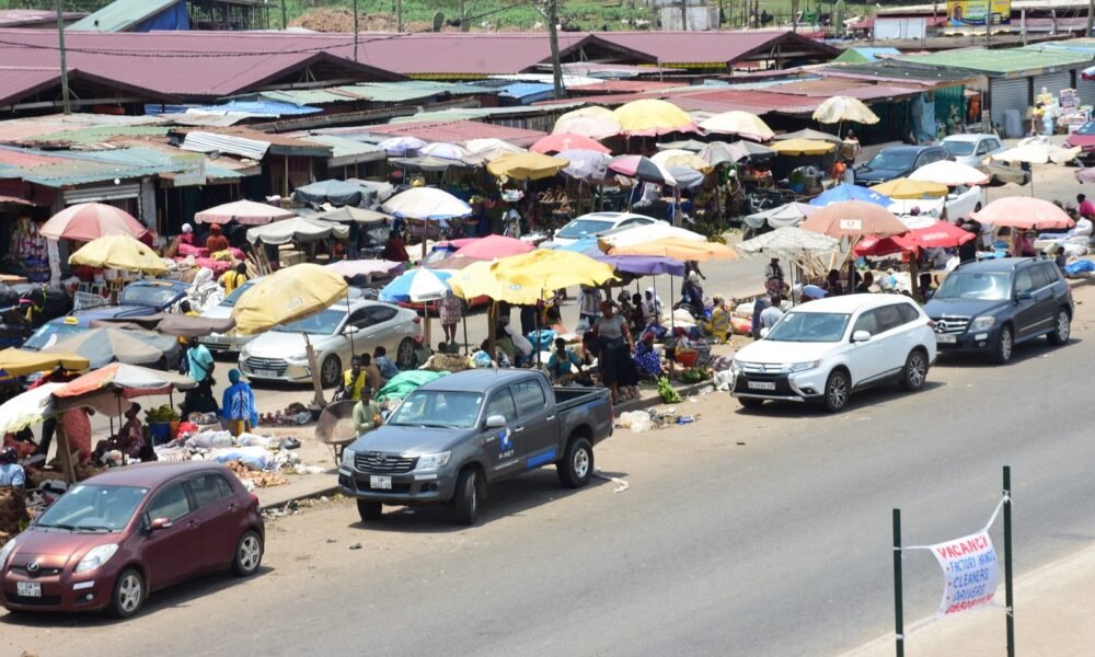vehichles parked on the shoulders of the road