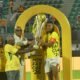 GFA Vice President, Mark Addo and FA Cup officials present the trophy to skipper Razak Simpson