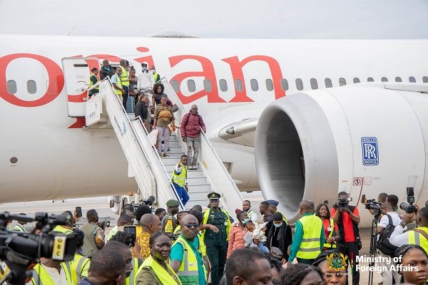 Ghanaians disembarking a flight from South Africa