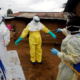 Health personal fumigating a home