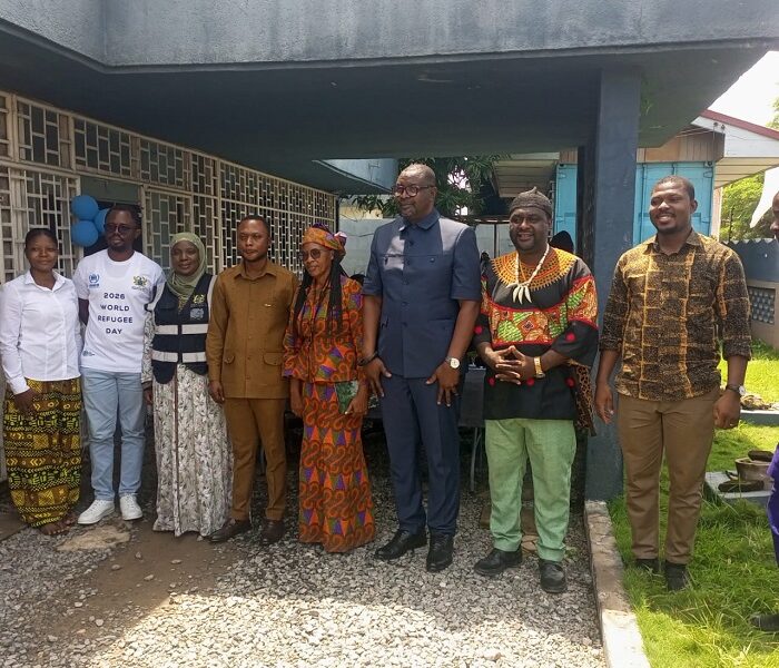 Mr Bediako (third from right) and Mr Azumah (fourth from right) with some refugees and executives of the Ghana Refugee Board