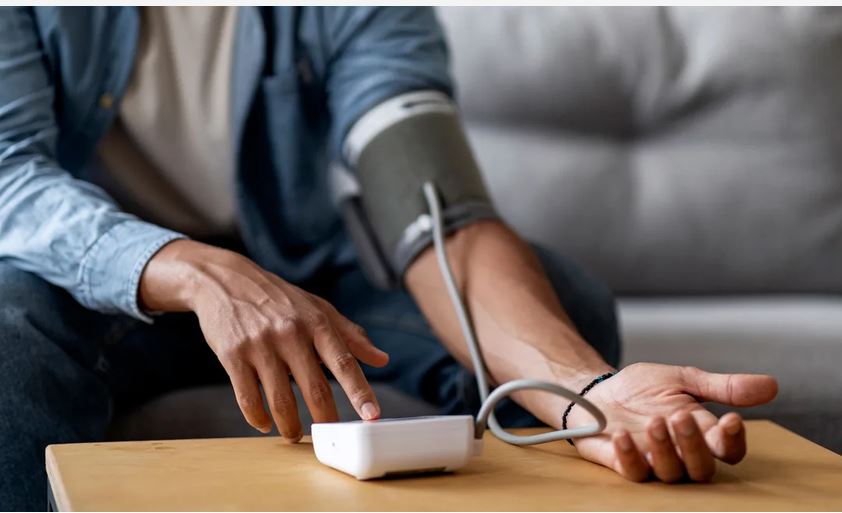 A patient's blood pressure being checked