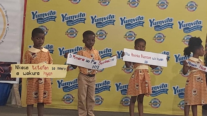 Children from Solomon School reciting a poem on lorry accident