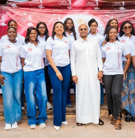 Dede Ayew flanked by the Miss Ghana contestants