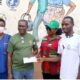 Dr Appiah (second left) with staff and members of the Paga Youth