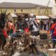 Police personnel collecting some of the rubbish