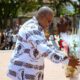 President Mahama laying a wreath at the Asomdwee Park in remembrance of the late President Mills