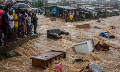 Some household items being washed away by the flood waters