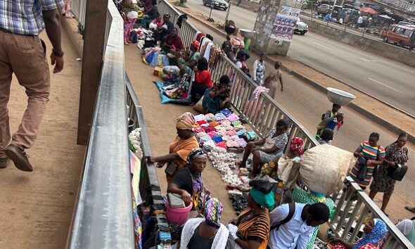Hawkers taken over the pedestrian walkway on the footbridge