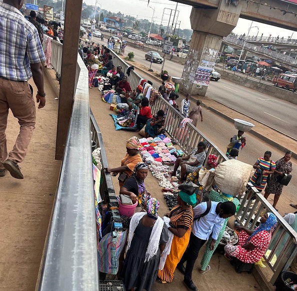 Hawkers taken over the pedestrian walkway on the footbridge