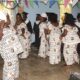 Some of the family members dancing