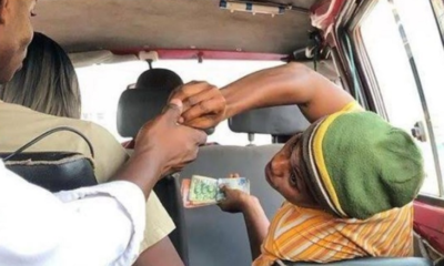 A passenger demands change from a driver's mate