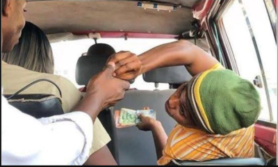 A passenger demands change from a driver's mate