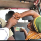 A passenger demands change from a driver's mate