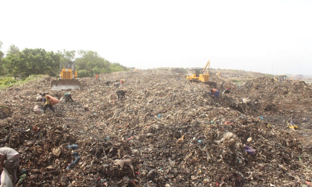 A heap of waste being cleared at Agbogbloshie in Accra.