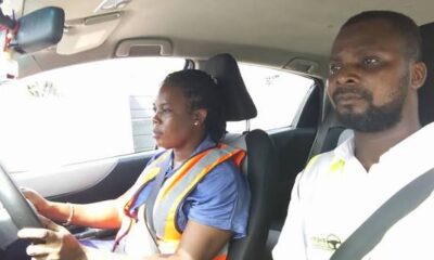 A woman learning how to drive