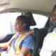A woman learning how to drive